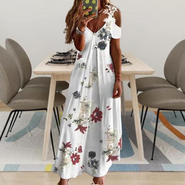 Dress in Bloom - il maxi abito floreale fresco e leggero